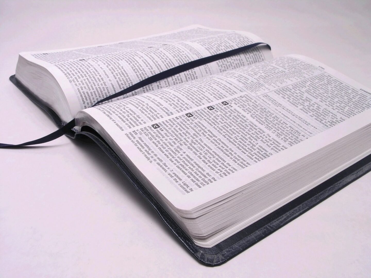 A book opened to the word of god.